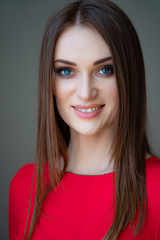 portrait beautiful girl long hair in red close-up