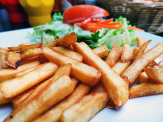 Golden French fries potatoes ready to be eaten