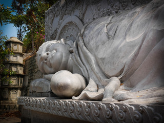 Fototapeta na wymiar Lying Down Gigantic White Marble Buddha in Nha Trang, Vietnam Stock Photo