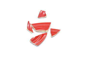 red shards of a plate. Concept of split and crisis