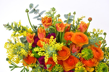Flower arrangement on white background : Ranunculus, tulip, mimosa, eucalyptus, carnation, dracaena