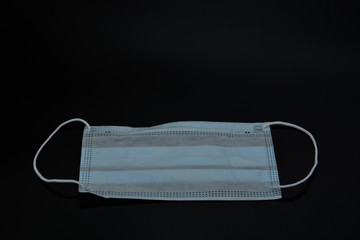 Novel coronavirus - 2019-nCoV, WUHAN virus concept. Surgical mask protective mask 