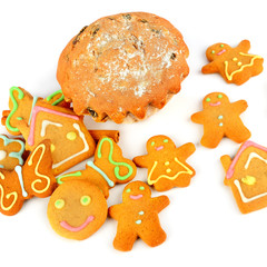 Cupcake and homemade cookies isolated on white .