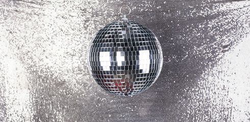mirror entertaining disco ball on a silver background
