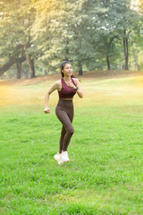 Beautiful Asian women exercise in the park every morning, It is a lifestyle for relaxation and good health of the body