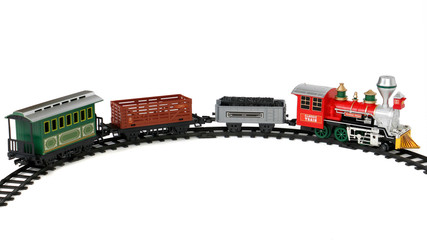 Toy train on tracks isolated on white background
