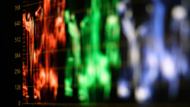 colorful histograms on black background.color grading.