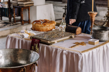 Priest perform  ritual Holy baptism christening