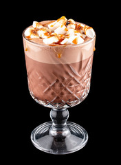 Cocoa with marshmallows and caramel. On dark background
