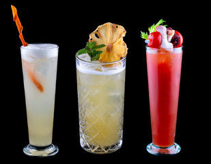 Exquisite original cocktails on a black background. Bloody Mary, pineapple, cider.