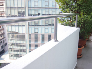 stainless steel balcony near room on the  building.