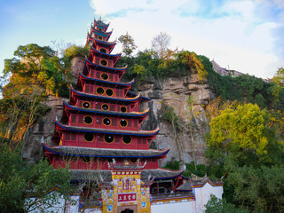 Red Shibaozhai temple embeded in the island rocks next to Yangtze River in China