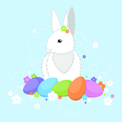 Easter bunny with colorful eggs and flowers