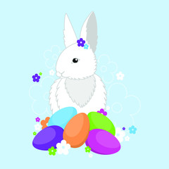 Easter bunny with colorful eggs and flowers