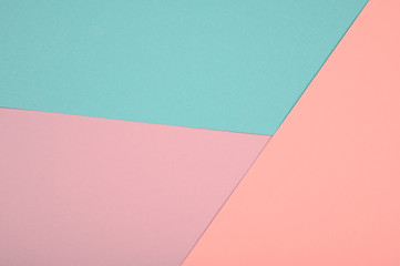 Abstract pastel colored paper texture minimalism background. Violet, peach and blue colors