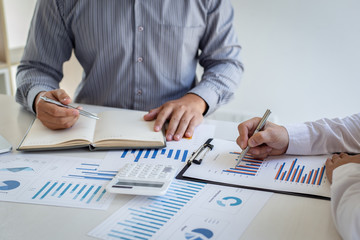 Business team meeting analyze financial graphs market growth reports And corporate income tax,...