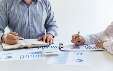Business team meeting analyze financial graphs market growth reports And corporate income tax,...
