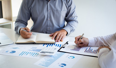 Business team meeting analyze financial graphs market growth reports And corporate income tax, Analysis of financial accounting and real estate investment concept..