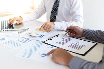 Business team meeting analyze financial graphs market growth reports And corporate income tax,...