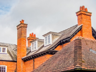 Red roof and chimneys with attic windows. Woodhall Spa. England