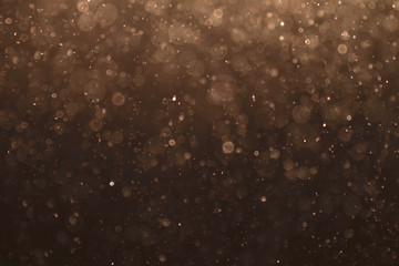 Abstract beautiful sparkling brown background.