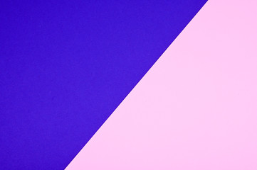 Two tone of ultramarine and pink paper background. Trend colors concept.