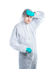 The epidemic of the Chinese coronavirus. A biologist in a protective suit is tired of work and wipes sweat from his forehead. Biological hazard. Vaccine against influenza, Ebola, tuberculosis.