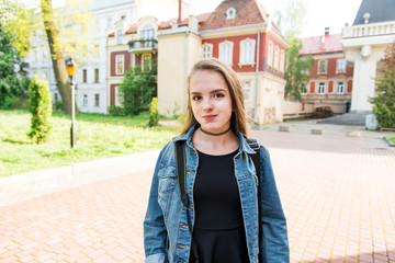 Portrait of a beautiful girl in park.