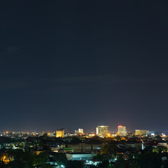 Fototapeta premium landscape city night with dramatic moody dark sky