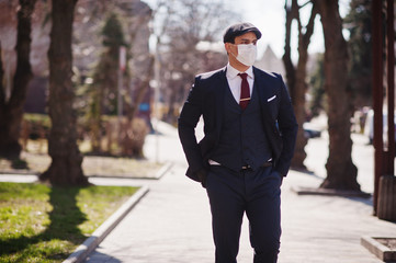 Concept of coronavirus quarantine. Business man wear on suit with medical face mask. MERS-Cov, Novel coronavirus 2019-nCoV