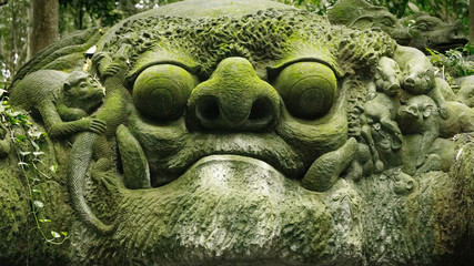 Stutue in Sacred Monkey Forest, Ubud, Bali, Indonesia - obrazy, fototapety, plakaty