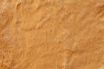 Brown real wool with a dark top texture background, orange natural wool,  fluffy fur texture for...