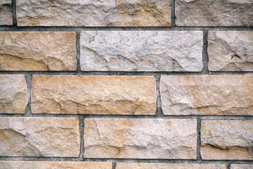 old grey brick wall texture background. Civil and industrial construction.