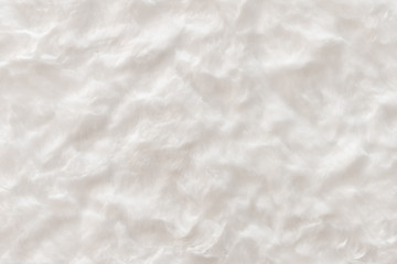 White real wool with a white top texture background, light natural sheep  wool, white seamless cotton, fluffy fur texture for designers, close-up white wool rug