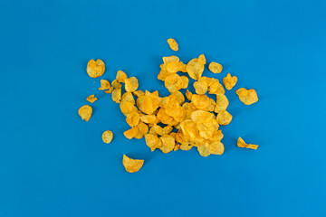 messy bunch roasted potato chips flat lay on the colorful background, simple minimalist style