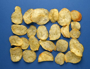 potato chips on a blue background