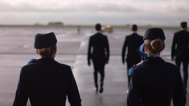 Crew walking to airplane