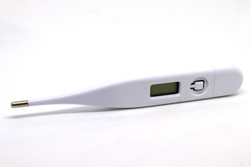 White analog thermometer standing on a white pure background