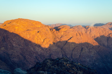 Fototapeta na wymiar View from the mountain of Moses, a beautiful sunrise in the mountains of Egypt
