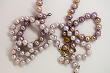 Some pearl stripes on a white background