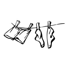 Socks and shorts are dried on a clothesline. Vector illustration in line art style. Isolated on a white background.