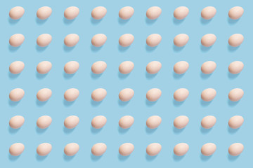 Beautiful eggs pattern on the flat background