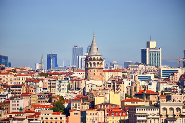 Fototapeta na wymiar Istanbul cityscape in Turkey with Galata Kulesi Tower. Ancient Turkish famous landmark in Beyoglu district, European side of the city. Architecture of the former Constantinople
