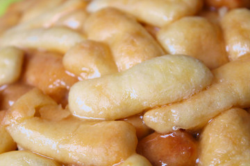 Chuck chuck - oriental flour sweets from dough and honey. Close-up. Background. Texture.