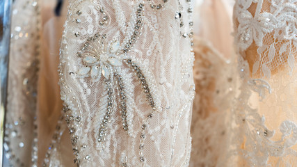 Close Up Of White Lace Wedding Dress