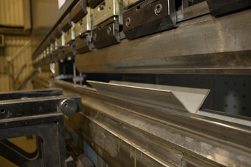 Fototapeta na wymiar Sheet metal bending in factory