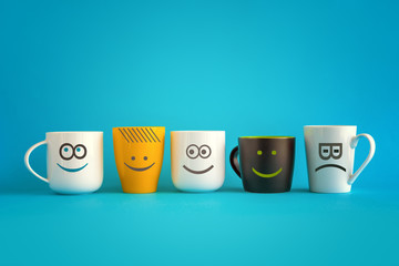 Coffee Cups with Happy and Sad Emoticons