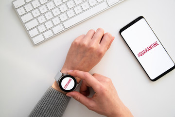 Quarantine and warning, attention, outbreak alert notification on mobile and smart watches devices. Stay at home advice to stop coronavirus COVID-19 spreading. Global pandemic Covid -19 prevention