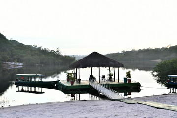 boat at the pier on one of the tributaries in the Amazon in Brazil