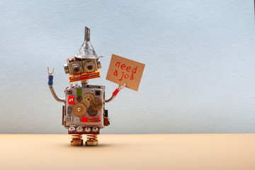 Dismissed robot wants to get a job and looking for an employer. Panicking unemployed robotic worker with a cardboard sign and handwritten text Need a job. copy - 331281865